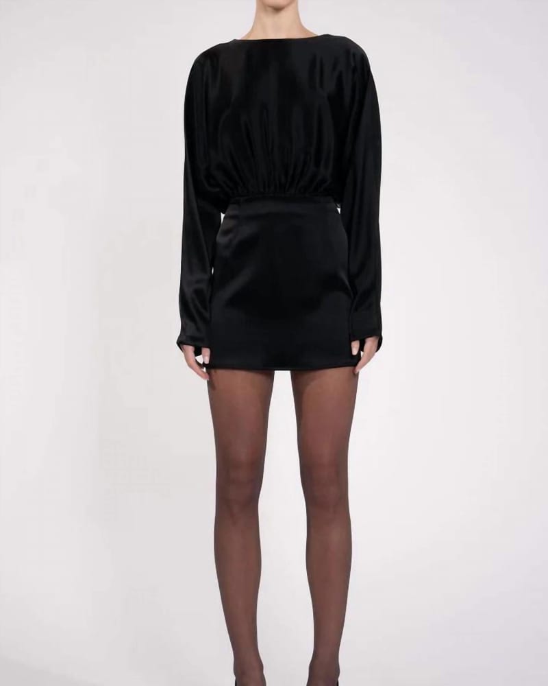 Front of a model wearing a size L Anne Dress in Black in Black by NONCHALANTLABEL. | dia_product_style_image_id:338975